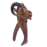 A Tyrolean carved wood ibex design nutcracker with glass eyes, length 21cm Perfect condition, no
