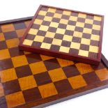 A large 19th century rosewood and satinwood inlaid chess board, 61cm across, and a smaller chess