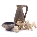 A group of terracotta Antiquities, comprising a single-handled ewer with incised Christian motif,