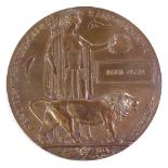 A First War Period bronze death plaque awarded to Peter Clark