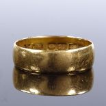 An Edwardian 22ct gold wedding band ring, maker's marks JM, hallmarks Birmingham 1909, band width