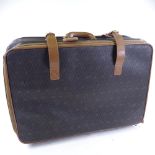 CHRISTIAN DIOR - a Vintage Honeycomb Monogram roll along travel bag / suitcase, circa 1970s,