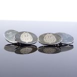 A pair of modern sterling silver oval cufflinks, laser engraved decoration, by A J Poole,