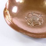 A Keswick planished copper Tudor Rose pattern fruit bowl, stamped R12 KSIA Keswick, 28cm across