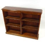 A 19th century mahogany double-fronted open bookcase, with adjustable shelves, width 4'10", height