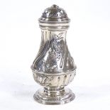 A George II silver sugar caster, baluster-form with fluted and relief embossed floral decoration, by