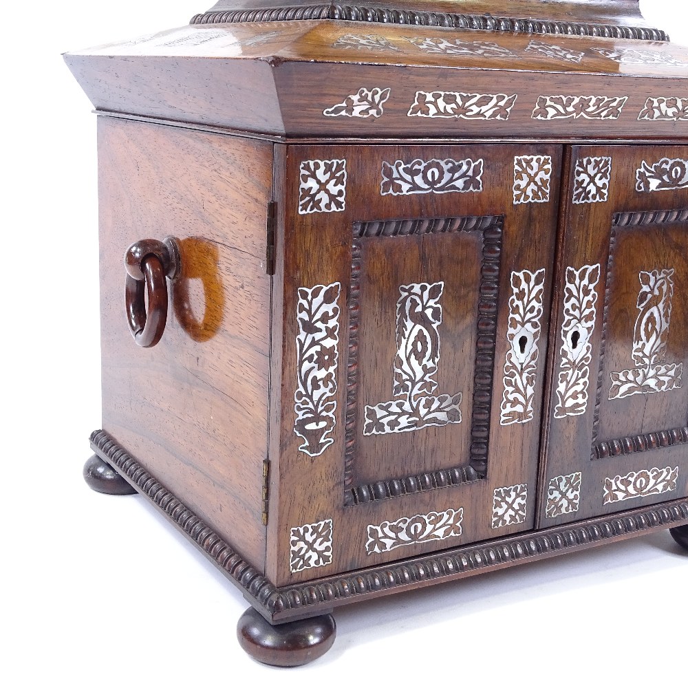 An early 19th century rosewood and mother-of-pearl marquetry inlaid sewing cabinet, the lid having a - Image 4 of 8