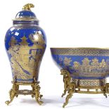 A Copeland Spode blue and gilt china fruit bowl, and pair of matching lidded jars, all on original