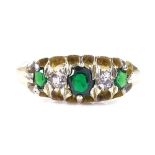 An Edwardian 18ct gold 5-stone emerald and diamond half hoop ring, total diamond content approx 0.