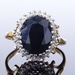 A 9ct gold sapphire and diamond cluster ring, maker's marks GJ, hallmarks Birmingham 1988, setting