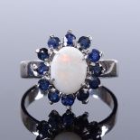 An unmarked white metal opal and sapphire cluster ring, setting height 13.9mm, size L, 3g Very