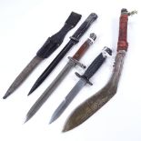 A German Second War Period bayonet and scabbard, 2 other Second War bayonets, and a kukri knife (4)