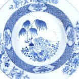 A large Chinese blue and white porcelain bowl, hand painted blossom trees, diameter 38.5cm Large