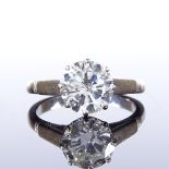 An 18ct white gold 2.49ct solitaire diamond ring, with open under-bridge and pierced heart bridge,