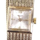 MARVIN - a lady's Vintage 9ct gold mechanical wristwatch, champagne dial with gilt baton hour