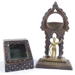 2 19th century pocket watch stands, comprising a parcel gilt-bronze stand surmounted by a knight