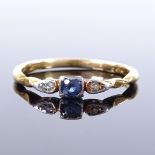 An 18ct gold 3-stone sapphire and diamond ring, pierced bridge and bevelled shoulders, maker's marks