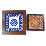 An Islamic glazed pottery tile, possibly Kutahya, in wood frame, overall dimensions 26.5cm x 26.5cm,