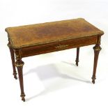 A 19th century French burr-walnut and tulip wood banded fold over card table, with ormolu edges