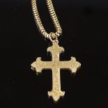 An unmarked gold cross pendant necklace, on 9ct snake-link chain, floral engraved cross, pendant