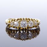 An Edwardian 18ct gold graduated 5-stone diamond half-hoop ring, total diamond content approx 1ct,