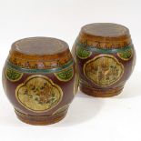 A pair of Chinese carved and painted wood barrel-shaped pots and covers, height 13"
