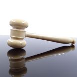 An ivory gavel, circa 1900, length 12.5cm There is a tiny chip on the side of the head next to the