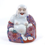 A Chinese porcelain seated Buddha with enamelled decoration, height 25cm Perfect condition