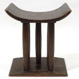 A Liberty & Co Ashanti style stool, illustrated in the Liberty Catalogue Small Pieces of Furniture