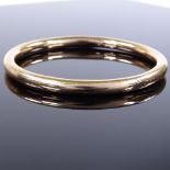 A 15ct rose gold slave bangle, band width 6.7mm, internal diameter 66mm, 18.2g Good original