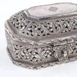 An Antique Middle Eastern Oman sterling silver Paan Betel box/casket, heavy pierced and embossed