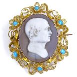 A Victorian relief carved cameo panel brooch, depicting male profile, in unmarked yellow metal