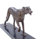A bronze patinated spelter greyhound on slate base, signed Rochard, base length 46cm Patination is