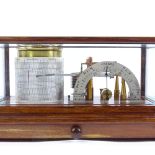 A Negretti & Zambra Regent barograph, mahogany-case with bevel-glass panels, length 42cm All in good