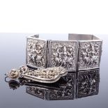 A Victorian silver panel bracelet, high relief Eastern style panels depicting Durga riding a Lion,
