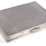 An Elizabeth II silver cigarette case, turned grid decoration with gilt interior, by Charles S Green