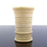 A 19th century ring turned ivory dice shaker, height 9cm, diameter 5.5cm Perfect condition with very