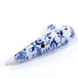A Continental blue and white porcelain ocarina flute, length 17.5cm Perfect condition, no