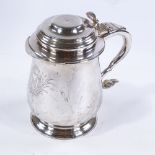 A large electroplate lidded tankard, inscribed under base "The Benjamin Franklin Tankard", height