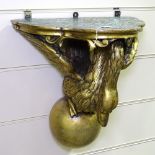 An ornate carved wood and gilt-gesso swan design wall bracket, height 18"