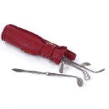 A late 20th century Continental silver manicure set, in the form of a golf club set and bag, club