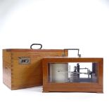 A German Second War Period walnut-cased barograph with inset metal plaque, serial no. 212N/G, length