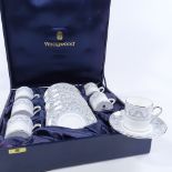 A Wedgwood Dolphins 6 place bone china coffee service, dolphin and shell decoration with silvered