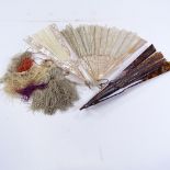 A group of Antique fans, including mother-of-pearl and lace, a tortoiseshell fan frame, and fan