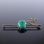 A 9ct gold cabochon malachite bar brooch, brooch length 63.9mm, 5.6g Very good overall condition,