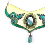 An Art Nouveau brass coloured enamel and stone set bib necklace, with central green lace agate and