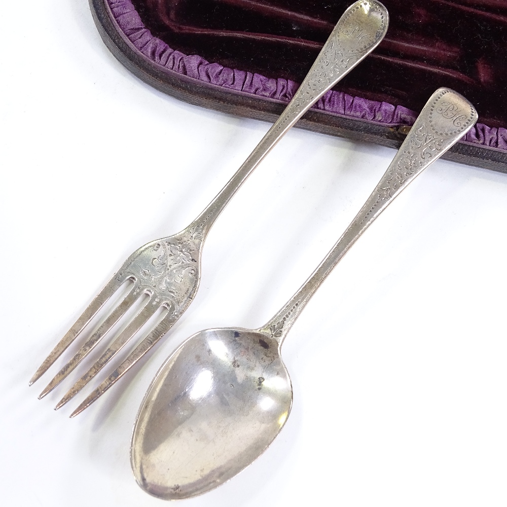 A silver cutlery set, comprising fork and spoon with bright-cut engraved decoration, hallmarks - Image 2 of 3