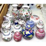 A group of Oriental items, including ginger jars, and vases, tallest 23cm