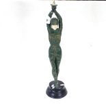 After Chiparus, painted and gilded resin sculpture, Art Deco style dancing lady, on resin plinth,