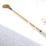 A hickory-shafted presentation putter, from St Andrews Golf Course